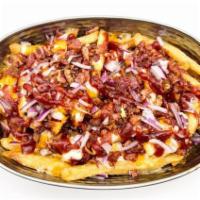 Smokey Fries · Our signature extra crispy fries topped with bacon, onions, mozzarella, cheddar, bbq sauce