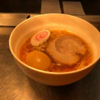 Kid's Ramen · Soy sauce based chicken broth topped with chashu, egg, and fish cake.