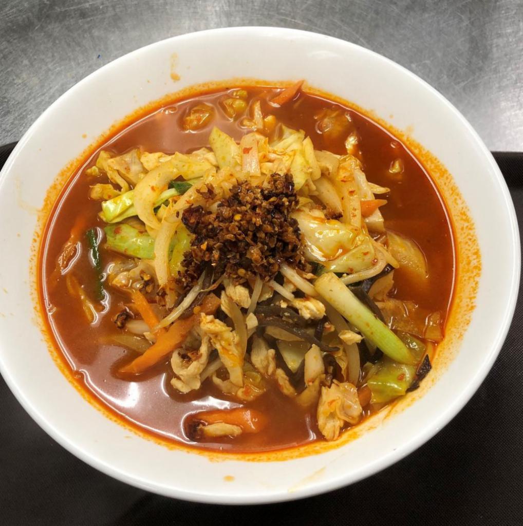 Challenge  Ramen · Hot and spicy soy sauce based chicken broth, topped with stir-fried chicken and vegetables, your choice in the degree of spiciness.