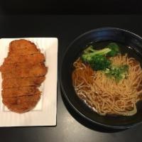Paiko Ramen · Soy sauce based chicken broth, topped with deep-fried pork cutlet, steamed broccoli, and gre...