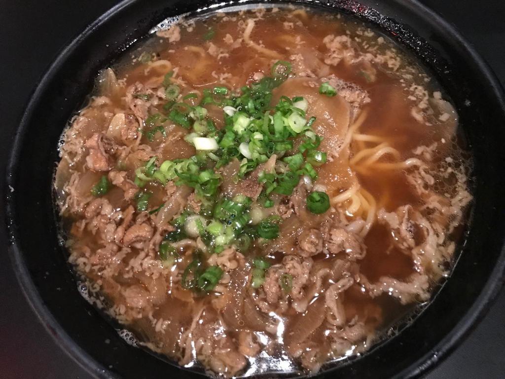 Niku Ramen · Soy sauce based chicken broth, topped with thinly sliced beef and onions.