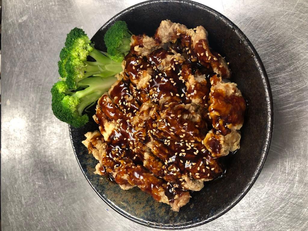 Sesame Chicken Don  · Bowl of rice, topped with batter-fried chicken, drizzled with house teriyaki sauce, sesame seeds, and steamed broccoli.