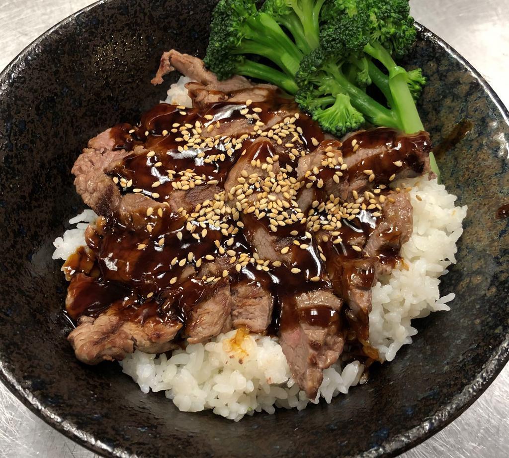 New York Steak Don  · Bowl of rice, topped with New York steak drizzled with house teriyaki sauce and steamed broccoli.