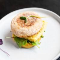 E Classic · Beyond Breakfast Sausage, Just Egg, Vegan Smoked Gouda  Cheese on an English Muffin.