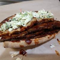 BBQ Brisket Sandwich · Cherry wood smoked, slow roasted, natural St. Helens beef, maple-bourbon BBQ sauce, roasted ...