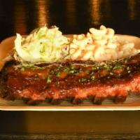 BBQ Pork Ribs · Cherry smoked St. Louis cut ribs, maple-bourbon BBQ sauce, habanero-pineapple-mustard sauce,...