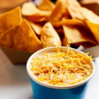 White Queso with Chorizo · Eight ounces of white creamy queso and melted cream cheese topped with mild chorizo and shre...