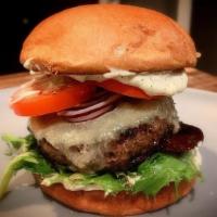 Soco Burger · Freshly ground short rib blended cooked to perfection, stacked up with Tillamook cheddar, ba...