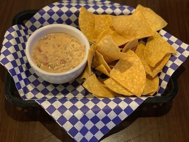 Chips and Queso · Fresh homemade creamy blanco cheese queso, served with made in house tortilla chips