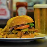 The American Classic Burger · 1/2 lb. Angus fresh seasoned  minced  beef patty served on brioche bun , Tomato ,onions ,let...