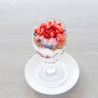 Greek Yogurt Parfait · Low-fat vanilla yogurt layered with granola, fresh strawberries and blueberries.
