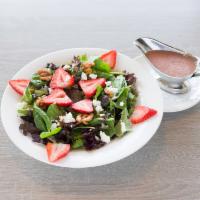 Very Berry Salad · BYC favorite. Mixed greens, goat cheese, sliced strawberries and caramelized walnuts with a ...