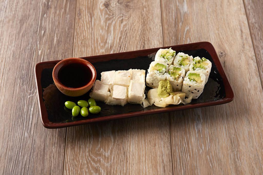 Soy Soy Soy Roll · Avocado and scallion rolled with soy paper topped with crispy tofu and edamame.