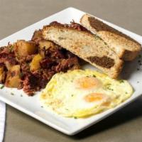 Corned Beef Hash · Home-made Guinness stewed hash served with two eggs cooked any style, and your choice of toa...
