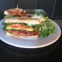 The BLTA Sandwich · Thick bacon, romaine, tomato, avocado and truffle aioli