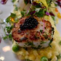 Seared Diver Scallops · Pea risotto, bure blanc, red wine reduction, and roe.