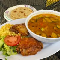 Sopa de Pollo · Chicken soup Served with dip fried chicken, Spanish rice, fresh salad and two hand made tort...