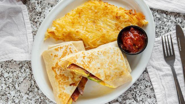 Bacon, Egg & Avocado Burrito · A large, grilled flour tortilla stuffed with smoked bacon, scrambled eggs, tomato, avocado, and cheese. Served with a side of salsa.