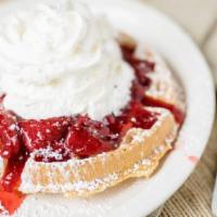 Strawberry Belgian Waffle · With whipped cream.