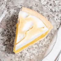 Lemon Meringue Pie · A sweet-tart lemony filling topped with light fluffy meringue; a true American tradition.