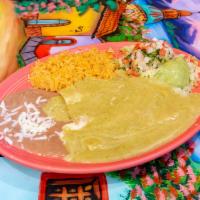 Enchilada Suizas · Corn of flour tortilla fried filled with chicken or beef cooked in special sauce served with...