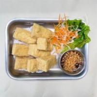 4.Fried Tofu · 8 pieces. Crispy fried tofu served with sweet-sour sauce and ground peanut on top.