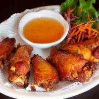 7. Angel Wings · 5 pieces. Deep-fried marinated chicken wings. Served with sweet-sour sauce.