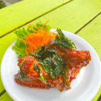 CHICKEN WINGS BASIL  · Deep-fried chicken wings mixed basil sauce with crispy basil.
