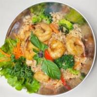 26. Hot Basil Fried Rice · Fried rice with egg, ground chili, onions, bell peppers, broccoli, carrots, basil leaves, be...