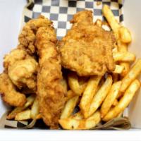 House Made Chicken Strips · Fresh chicken tenders hand dipped in buttermilk and our signature breading, served with frie...