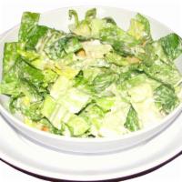 Caesar Salad · Fresh romaine topped with Parmesan cheese and croutons.