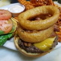 BBQ Bacon Burger · Beef patty topped with BBQ sauce, bacon, fried onion rings and cheddar cheese.