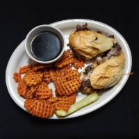 The Big Dipper Sandwich · House-smoked roast beef piled high on a toasted French roll with caramelized onions, mushroo...