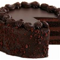 Layered Chocolate Cake · One slice of fresh and rich chocolate fudge layered cake.