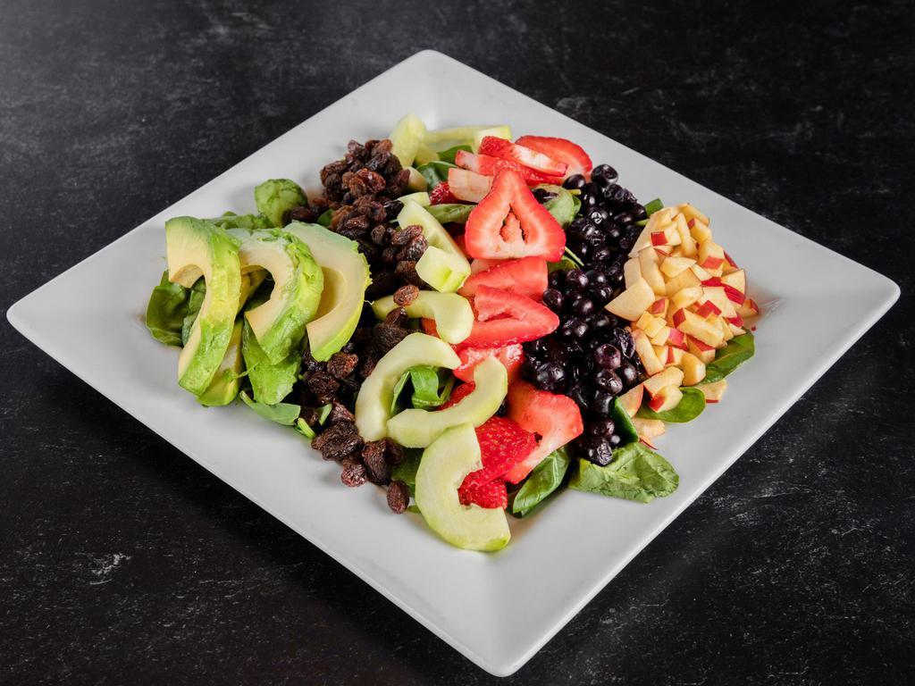 The Alkaline Salad · The Alkaline salad, baby spinach, avocado, blueberries, strawberries, apples, cucumbers and raisins presented with raspberry vinaigrette.