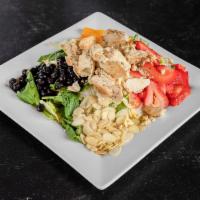 Strawberry Chicken Salad · Mixed greens, marinated grilled chicken, fresh strawberries, almonds and oranges. Served wit...