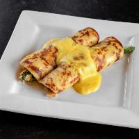 Chicken Florentine Crepes · House made crepes stuffed with marinated chicken, sauteed spinach, Swiss cheese and topped w...