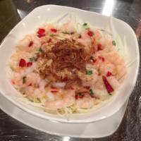 A3. Papaya Salad · Choice of grilled pork or shrimp. Shredded papaya with a hint of mint in sweet and sour sauc...