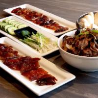 Peking Duck Dinner for 3 persons · 5.5~6 lb duck, serves with cucumber, scallion, hoisin sauce and 18 pcs steamed bun