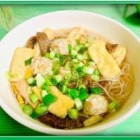 E2. Pho (Phở) · Rice noodles, vegan beef, tofu, vegan pork, sprouts, basil, onion... (Gluten Free Option)
