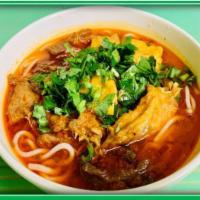 E3. Hue Spicy Noodle (Bún Huế) · Rice noodles, vegan beef, tofu, bean sprouts, basil, cabbage, chili oil... (Gluten Free Opti...
