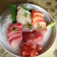 Sashimi Deluxe · 23 Pieces sashimi. Served with miso soup.