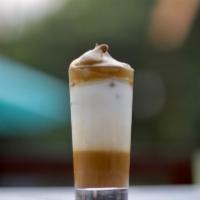 46. Dalgona Vietnamese Coffee (NEW) · Traditionally brewed imported Vietnamese coffee with topped off  Bustelo Whipped coffee cream.