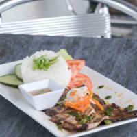 Grilled Pork & Rice/Cơm Thịt Nướng · grilled pork, rice , pickled carrots & diakon, cucumber, tomatoes, lettuce,  fish sauce
