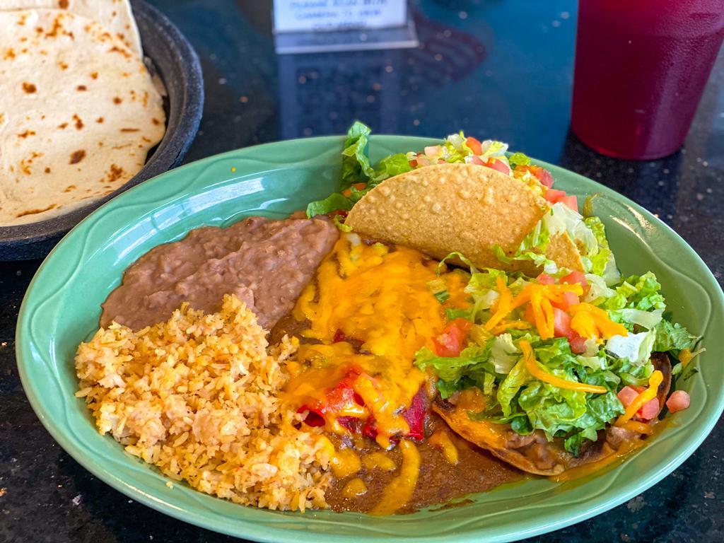 Taco Haven Enchilada Plate · 2 cheese enchiladas with beef gravy, 1 beef or chicken soft or crispy taco, 1 bean & cheese chalupa,
served with guacamole.
