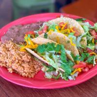 Crispy Taco Plate · 3 Tacos filled with your choice of picadillo or pollo guisado; topped with lettuce, tomato a...