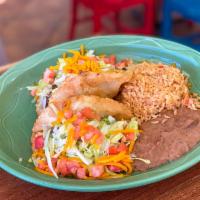 Puffy Taco Plate · 2 tacos filled with your choice of picadillo or pollo guisado; topped with lettuce, tomato a...