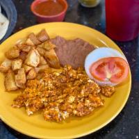 Chorizo con Huevo Mixed plt · Served with potatoes and refried beans.