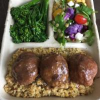 Turkey Meatballs in Lingonberry Sauce Plate · On a bed of grains with two sides