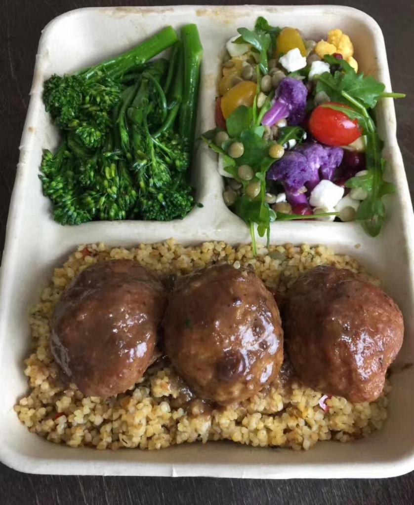 Turkey Meatballs in Lingonberry Sauce Plate · On a bed of grains with two sides
